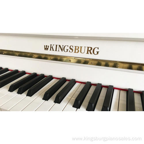 white upright piano is selling